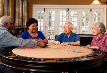 Social engagement: Residents playing a card game