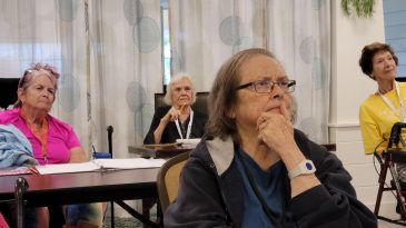 Residents sitting and paying attention in class