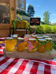 Jars of the honey produced by the bees in the community