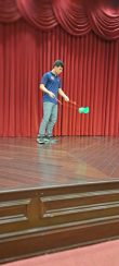 A Belen student putting on a Chinese yo-yo performance