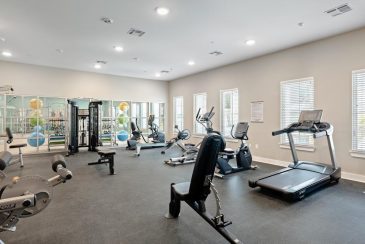 An exercise room in one of the communities